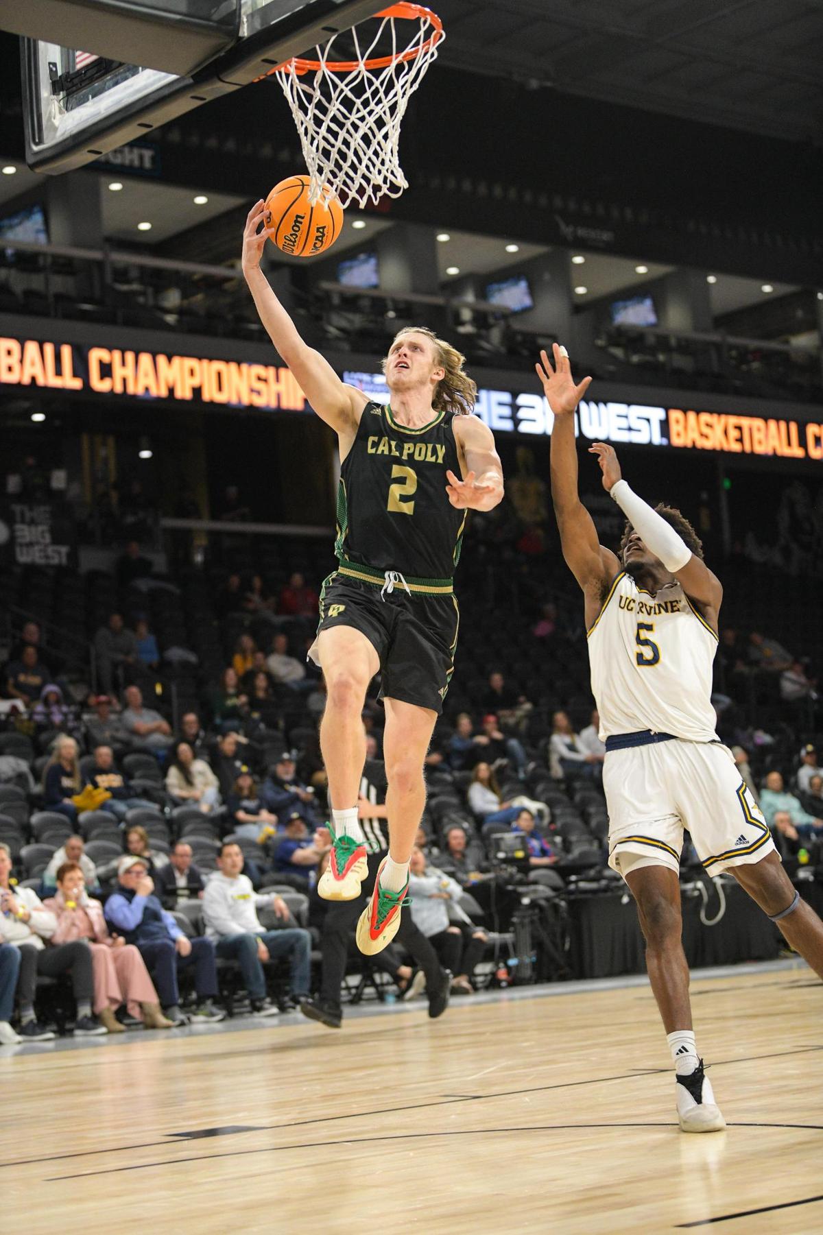 Mac Rinicker goes for a layup in Cal Poly’s 96-78 semifinal loss to UC Irvine at the Big West Championships on March 14, 2025.