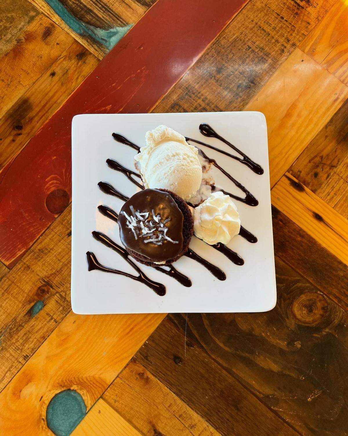 German chocolate cake served with ice cream is one of the desserts on the menu at Atascadero Bistro.