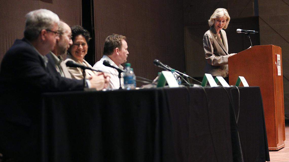 Congresswoman Lois Capps, right, introduces the panel for the Building a Clean Energy Economy: Challenges and Opportunities for the Central Coast, panel discussion at Cal Poly. The panelist were: Bill Toman, left, of CAlWave, Tryg Lundquist of Cal Poly, Dawn Legg of EVC First Solar, and Mitch Samuelian of NRG.