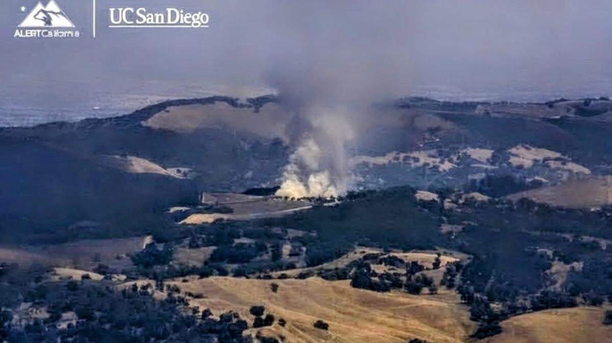 Smoke rises from the Rock Fire west of Paso Robles on Sunday, May 10, 2026.