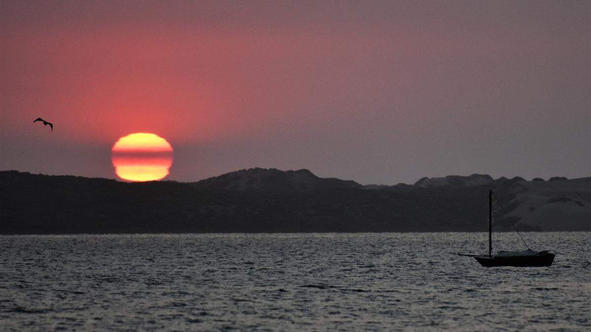 PG&E meteorologist John Lindsey this photo of a red sunset due to smoke a few years ago at Morro Bay.