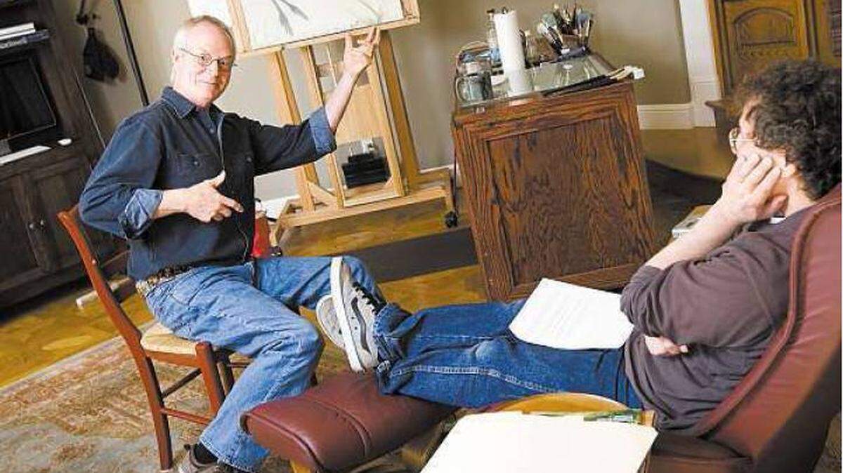 Jerry Scott, left, gives an animated answer to a question by Leigh Rubin at Scott’s Arroyo Grande home.