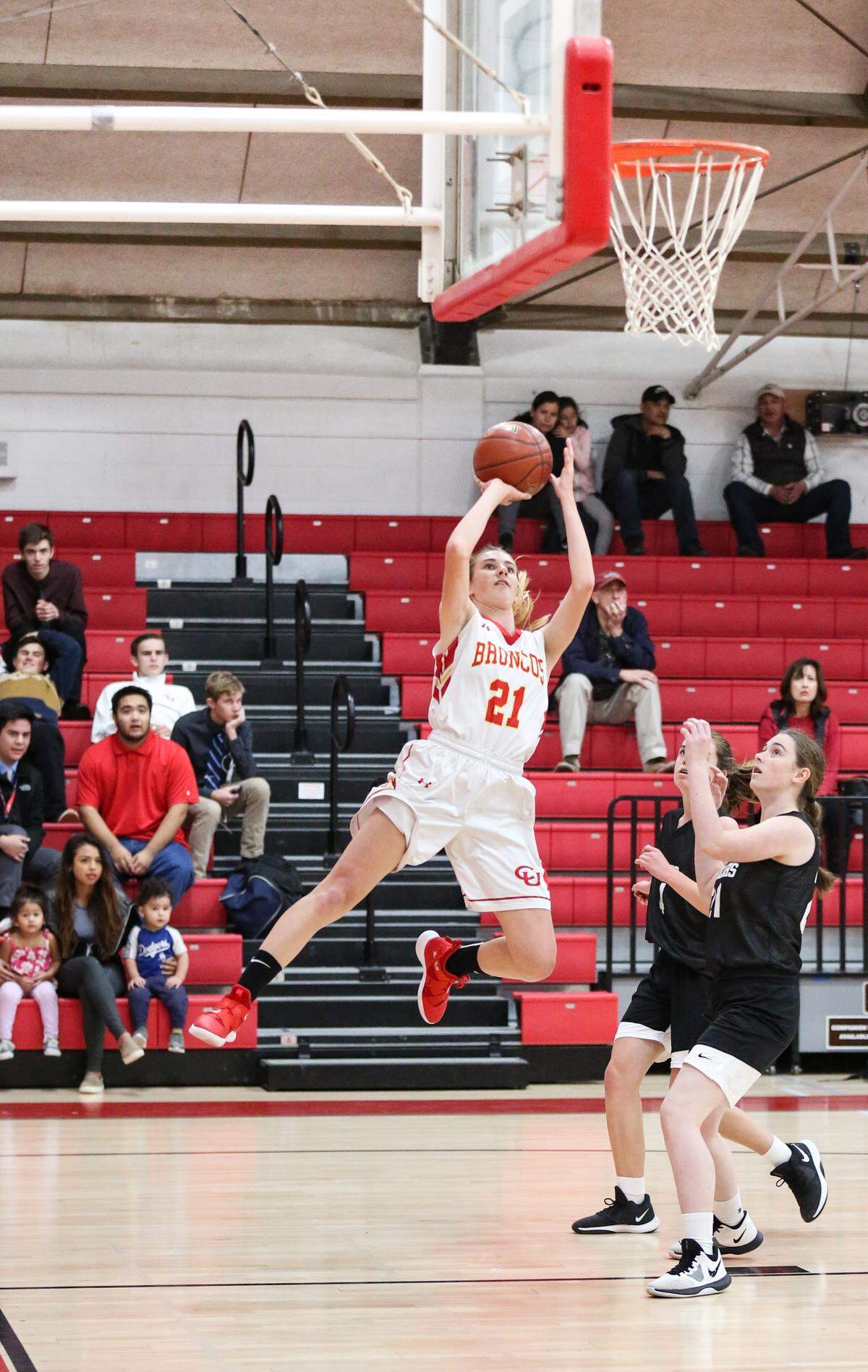Senior Karis Lawson scored 14 points and dished out eight assists in Coast Union’s win over Dunn School on Jan. 25. Here she goes up for a layup earlier in the season.
