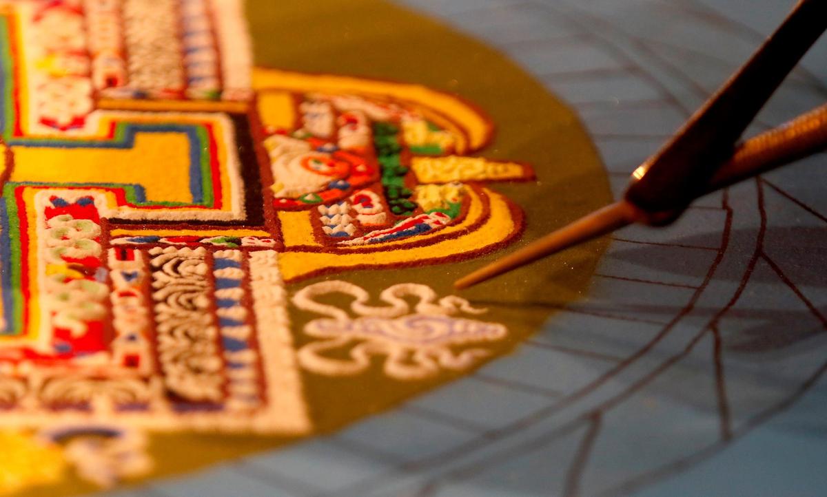 Tibetan monks from India began to build a sand mandala at the Aligned Acupuncture and Wellness Spa in San Luis Obispo on Sept. 24, 2024. They will destroy the mandala on Sept. 27, 2024.