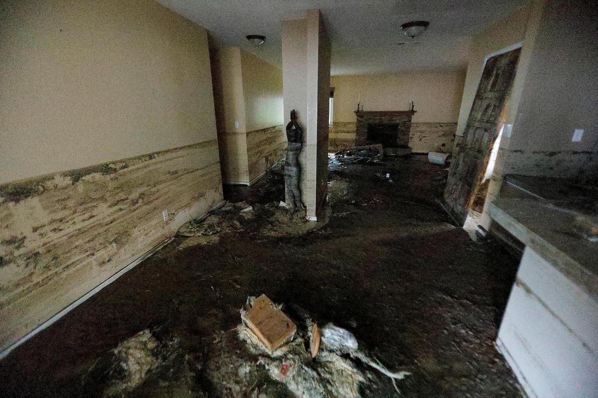 One home on Vista Court in Los Osos was hit particularly hard when a water retention basin failed on Monday, Jan. 9, 2023, sending a wall of floodwater through the house, up to three feet on the walls.