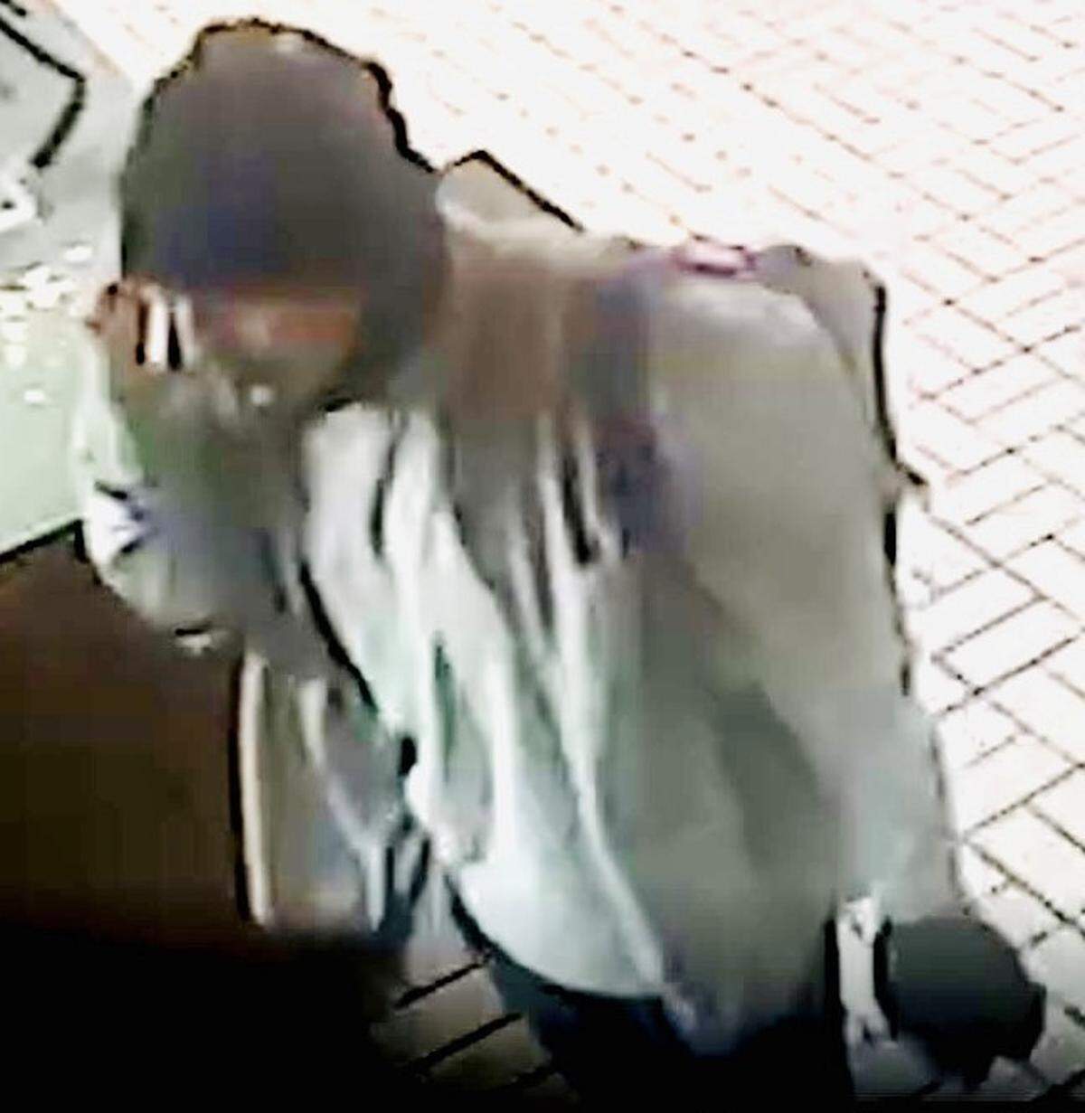 A blurry still from a surveillance camera shows the suspect in an armed robbery at a Paso Robles Carl’s Jr. restaurant on July 21, 2022.