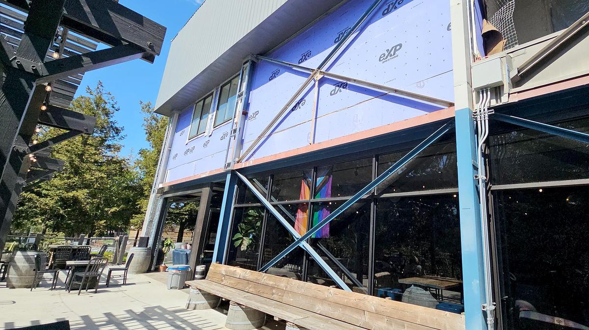 Exposed wrapping material can be seen at the entrance to Bang the Drum brewery, at the building at 1150 Laurel Lane in San Luis Obispo in March 2025. The tenants have been told they have to vacate the property due to unsafe construction conditions.