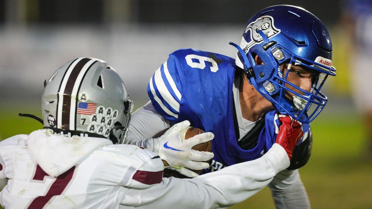 Caleb Calhoun is tackled by Noah Murillo. Morro Bay hosted Mt. Whitney High School for week two of the football season. The Pirates fell to the Pioneers 28-16.
