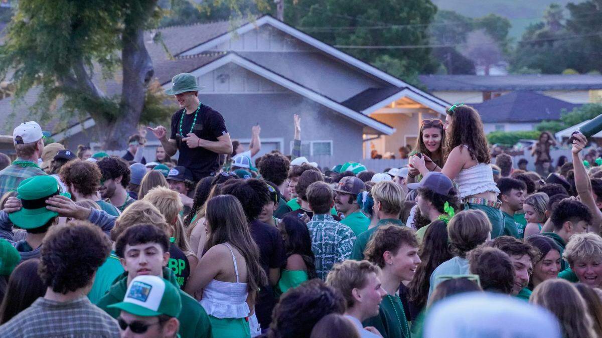 Cal Poly students turned out early Saturday morning, March 16, 2024, for St. Fratty’s Day festivities on Hathway Avenue near the university. A San Luis Obispo Police Department officer at the scene estimated between 6,000 and 7,000 people in attendance.