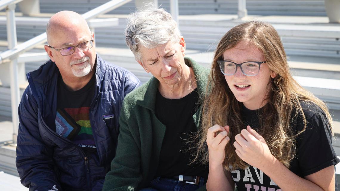 From left, parents Trevor and Hilary and their transgender daughter Lily at Arroyo Grande High School, where they discussed Lily’s experience participating on the girls track team.