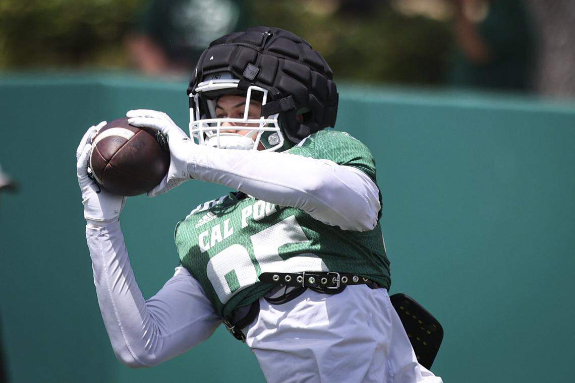 Alek Marshallmakes a cartch at a Cal Poly football scrimmage at Musting Memorial Field on Aug. 22, 2025.