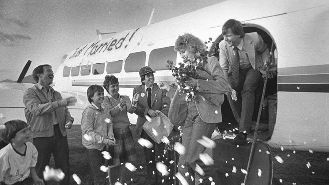 Former Swift Aire pilot Fred Driggs and Martha Estrada are greeted by friends after their wedding in 1982.