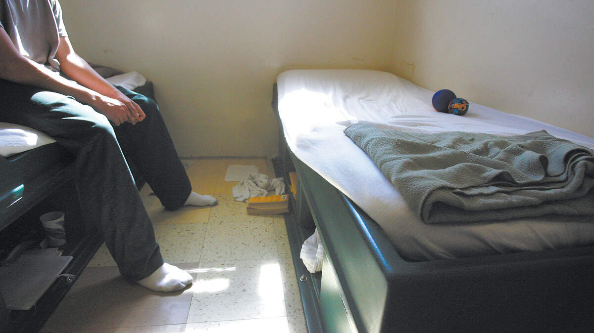 A ward in one of the austere rooms at the Juvenile Services Center. Some  rooms have two beds and two wards others have one. Books are about the only  entertainment when you are locked in. David Middlecamp 10-5-6