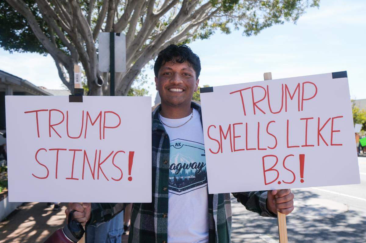 Cal Poly student Joshua Mathew attends the “Hands Off!” rally at San Luis Obispo Superior Court on April 5, 2025.