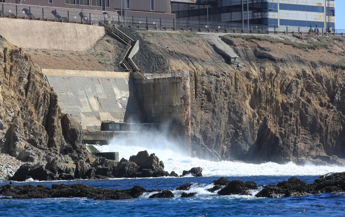 Warm water pours out from the discharge structure of Diablo Canyon nuclear power plant as seen on Feb. 25, 2022. Each day, the plant releases 2.5 billion gallons of warm ocean water that is used to cool the plant. The water has changed the ecosystem in Diablo Cove to more resemble habitats in Southern California. To dismantle the discharge structure, PG&E proposes building a cofferdam in the ocean to form a water-tight barrier and isolate the area for demolition work.