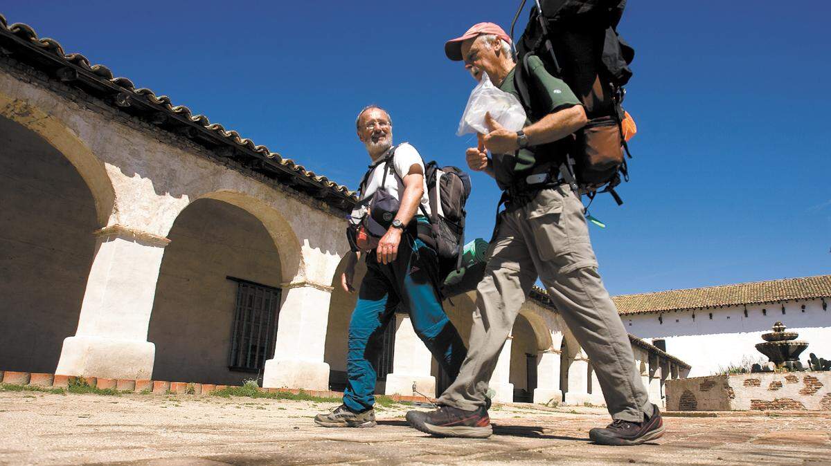 Ron Briery and Beppe Sala walk into the courtyard at Mission San Miguel in April during their journey to visit all 21 of California’s missions on foot. Of this next trip, Briery said, ‘I’m just taking a hike, and anyone is welcome to join me.’