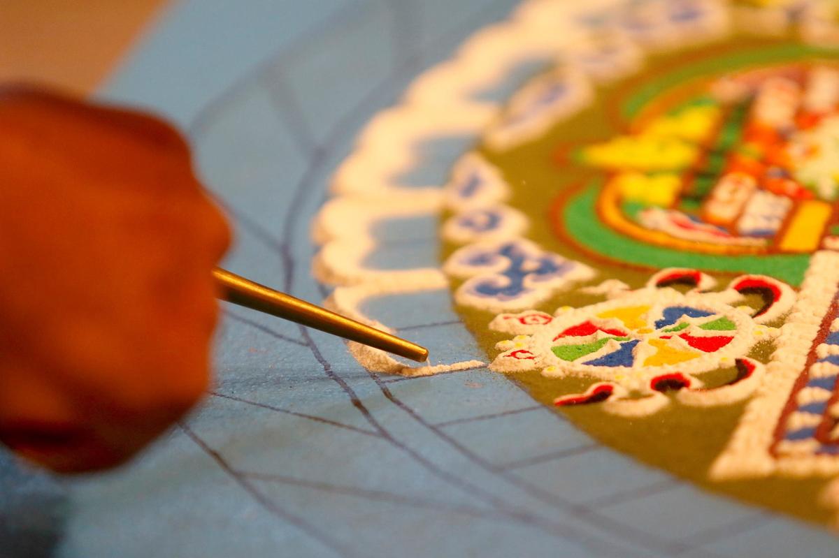 Tibetan monks from India began to build a sand mandala at the Aligned Acupuncture and Wellness Spa in San Luis Obispo on Sept. 24, 2024. They will destroy the mandala on Sept. 27, 2024.