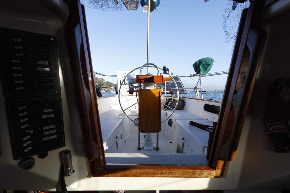 Spencer Waterman, a young professional who works in San Luis Obispo, lives part time on his 34-foot sailboat in the Morro Bay Harbor.