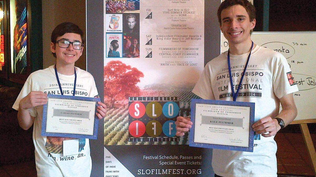 Carlos, left, and Kyle Plummer hold certificates they earned in competition at the San Luis Obispo International Film Festival.
