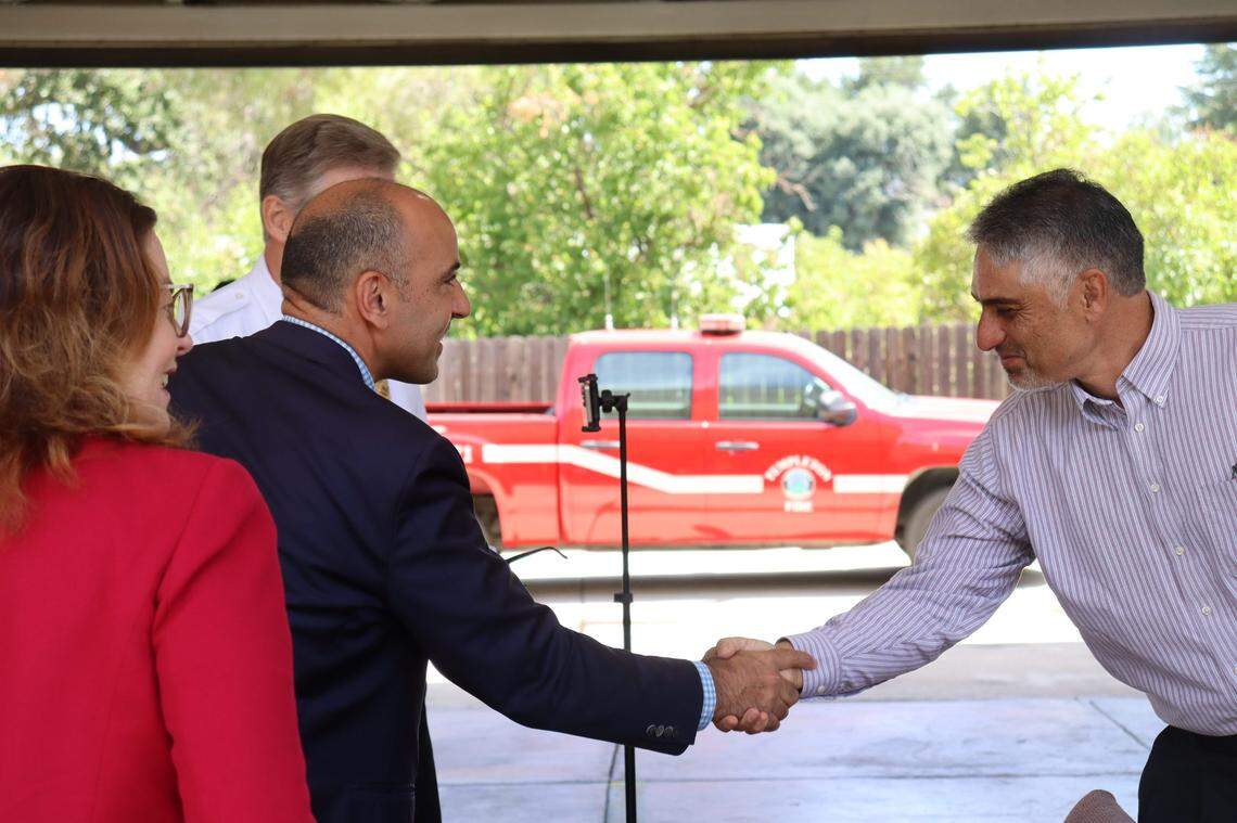 Congressman Jimmy Panetta shakes hands with Templeton Community Services District President Navid Fardanesh at the Templeton fire station. The town’s fire department is slated get a new fire truck with an influx of federal funding secured by Panetta’s office.