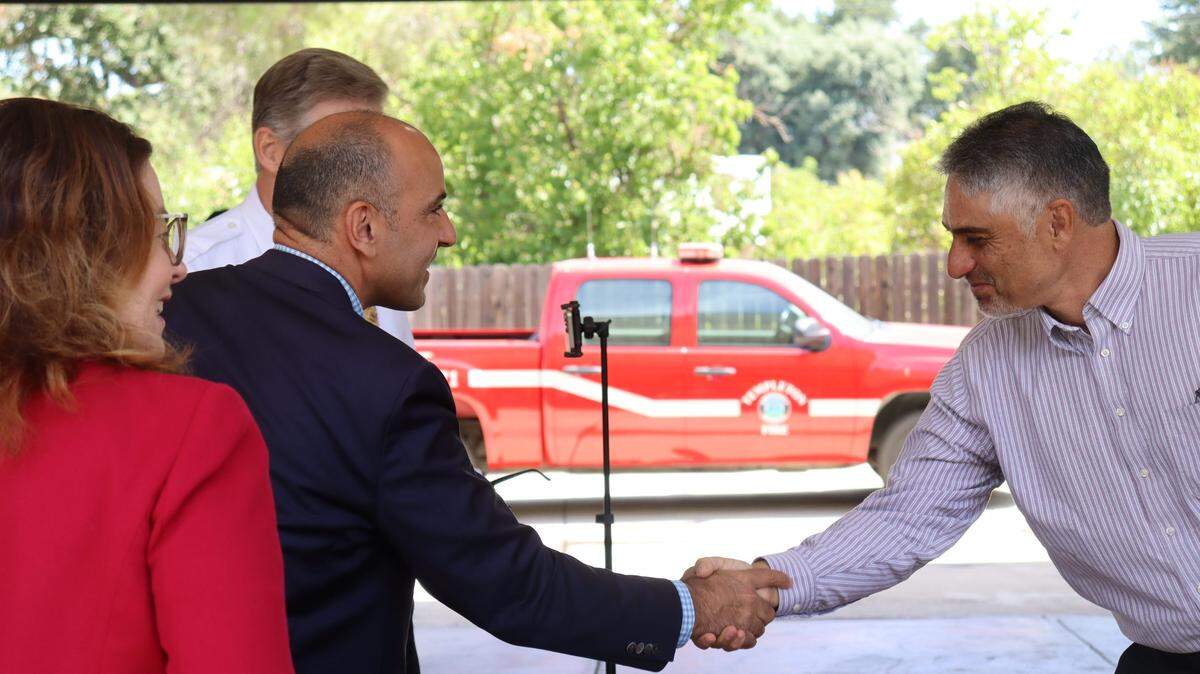Congressman Jimmy Panetta shakes hands with Templeton Community Services District President Navid Fardanesh at the Templeton fire station. The town’s fire department is slated get a new fire truck with an influx of federal funding secured by Panetta’s office.