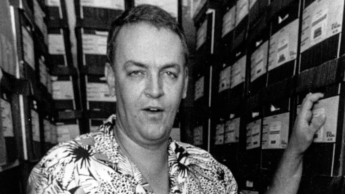 In a photo taken July 14, 1987, author Gustav Hasford stands in a San Luis Obispo storage locker that held research for an upcoming work.