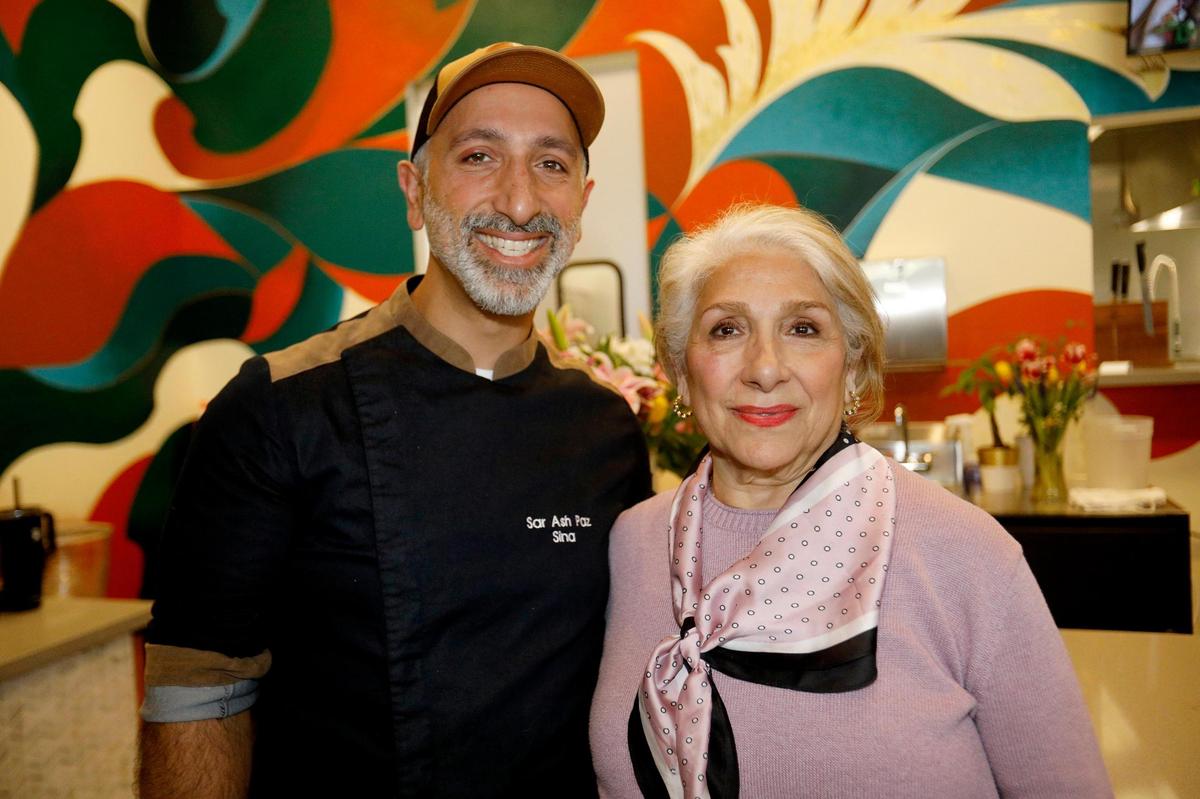 Shekamoo owner Sina Shakerian poses with his mother Sue Abdizadeh who came to help with the grand opening on Jan. 24, 2025. Shekamoo Grill celebrated its grand opening at SLO Ranch Farms & Marketplace in late January 2025. The new restaurant is one of the first Persian cuisine spots in San Luis Obispo.