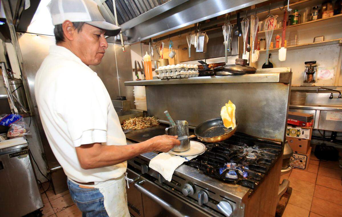 Louisa’s Place diner has been serving breakfasts and lunches at 964 Higuera St. in downtown San Luis Obispo since it opened in 1958. Kitchen manager Vicente Flores has been cooking at Louisa’s since 1991.
