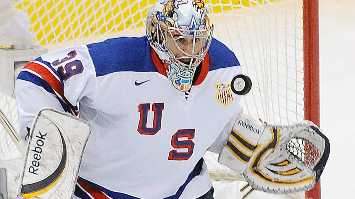 American goalie Ryan Miller keeps his eye on the puck against Canada. (Clem Murray / Philadelphia Inquirer / MCT)