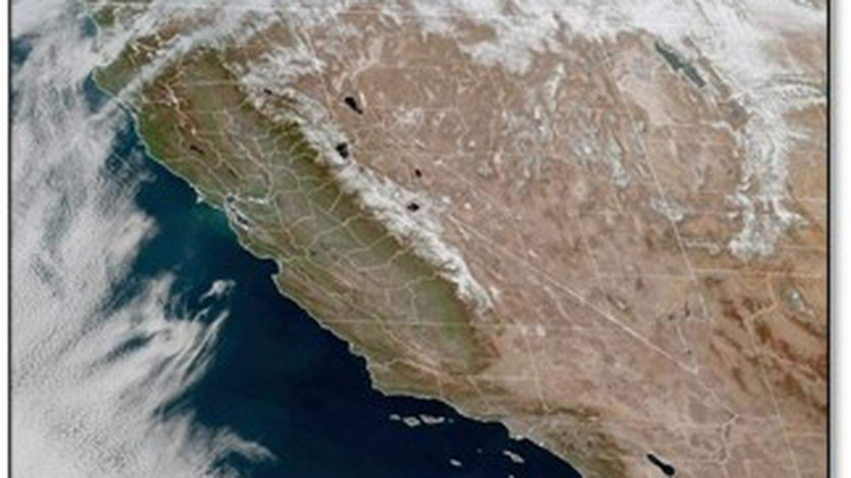 A satellite photo shows how the marine layer has been pushed off the coast of California.