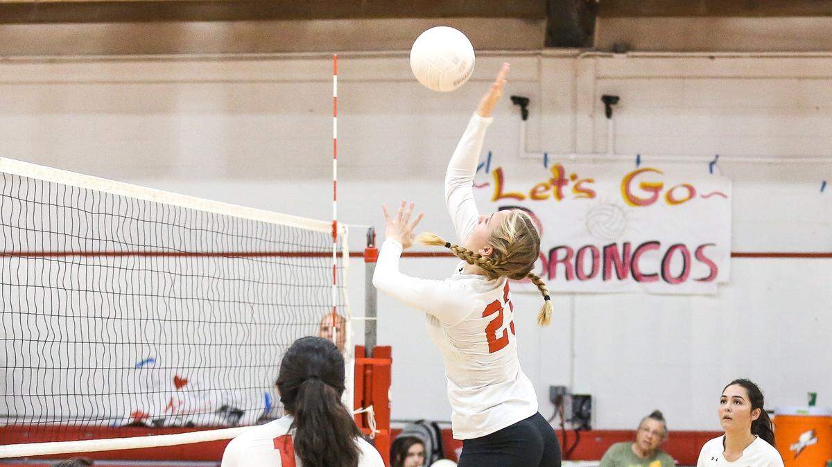 Coach Union High School volleyball team junior Ellie Kennedy (23) is expected by head coach Pam Kenyon to be a leader on the 2018 team. Here she prepares to spike during the 2017 season.