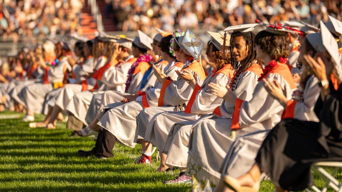 Atascadero High School students applaud for the class president during commencement ceremonies on Wednesday, June 3, 2026. 296 seniors walked the stage and received their diplomas.