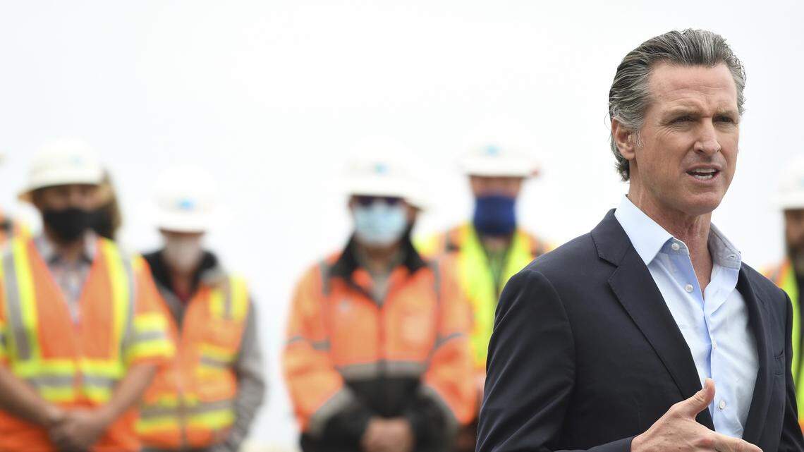 California Gov. Gavin Newsom speaks during a news conference about the newly reopened Highway 1 at Rat Creek near Big Sur on Friday, April 23, 2021. Heavy rainstorms in January 2021 caused a landslide, which closed the scenic highway.