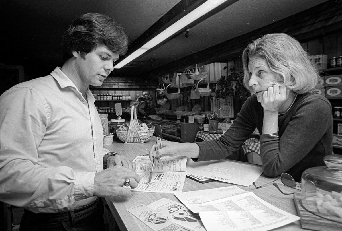 Terry Boal of the Kracker Mill gets a program underwriting pitch from KCBX-FM’s Development Director Betsy Camp. This image is from Oct. 10, 1980.