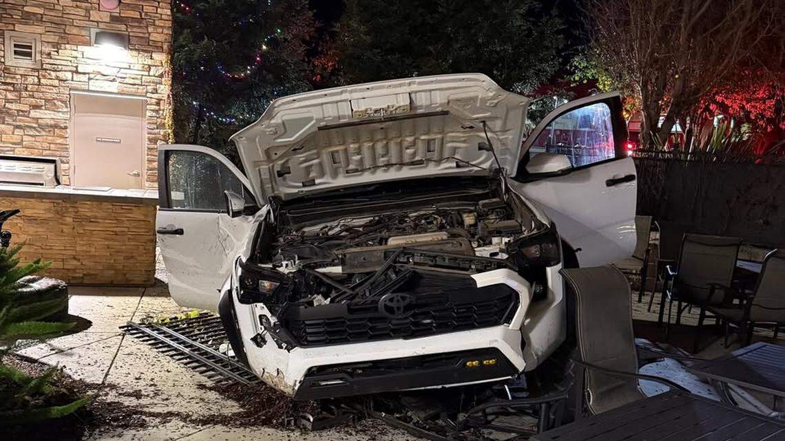 The San Luis Obispo Police Department arrested a driver for suspected driving under the influence after they crashed a pickup truck through a fence and into the patio of SESLOC Credit Union late Monday, Dec. 29, 2025.