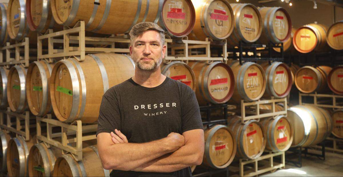 Kory Burke, owner and winemaker at Dresser Winery, is processing how tariffs will impact his business, which imports equipment and barrels from Europe, seen here on Aug. 28, 2025.