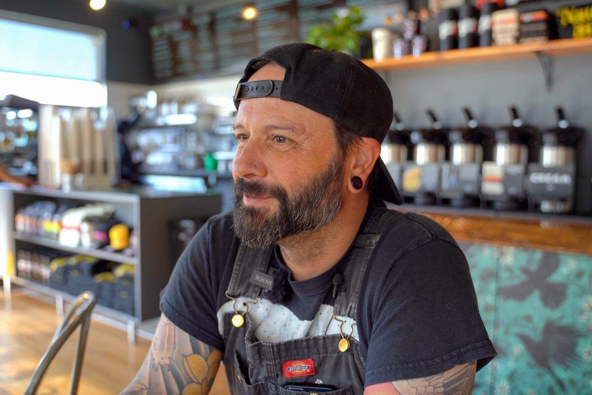 Nautical Bean owner Brett Jones sits inside the new Nautical Bean in Morro Bay on Wednesday, Sept. 3, 2025. Nautical Bean's fifth location in San Luis Obispo County opened in Morro Bay at 911 Main Street on Labor Day weekend.