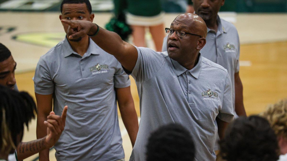Head coach John Smith calls substitutions during a time out. Cal Poly basketball opened its season with a 94-59 win against Bethesda University on Nov. 7, 2022.