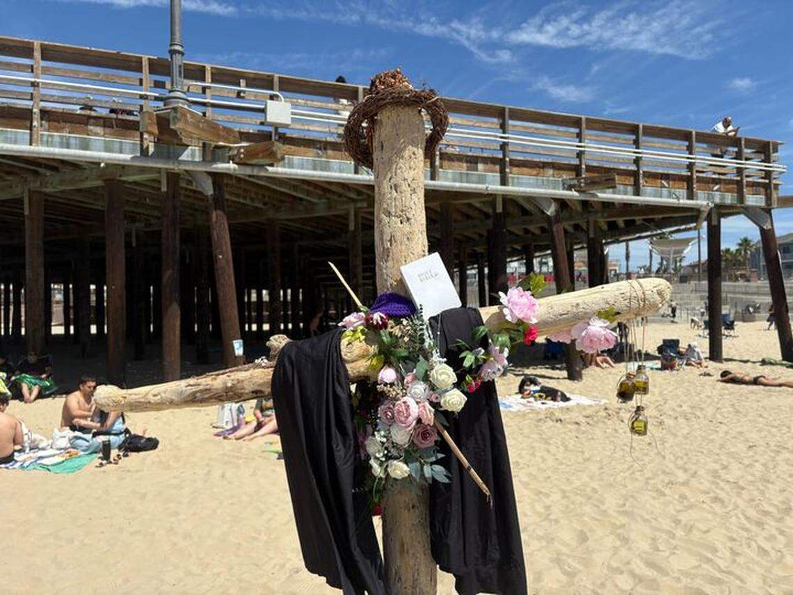 A driftwood cross was erected in the sand at Pismo Beach near the pier in late March, pictured here on Friday, April 3, 2026.