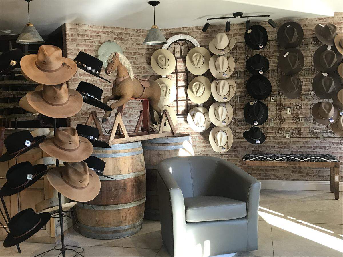 The hat bar at the Luxe Ranch Western Outfitter in Cambria includes toppers by Stetson and Charlie Horse.