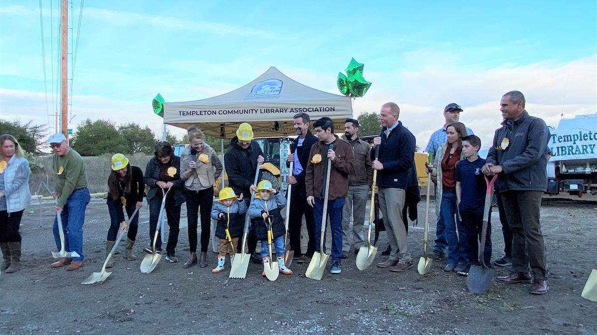 Supporters of the Templeton Community Library Association, including Melinda Reed (center, microphone) and Josh Gibson (center to Melinda’s right) and his sons at the groundbreaking ceremony for the library on Nov. 9, 2021.