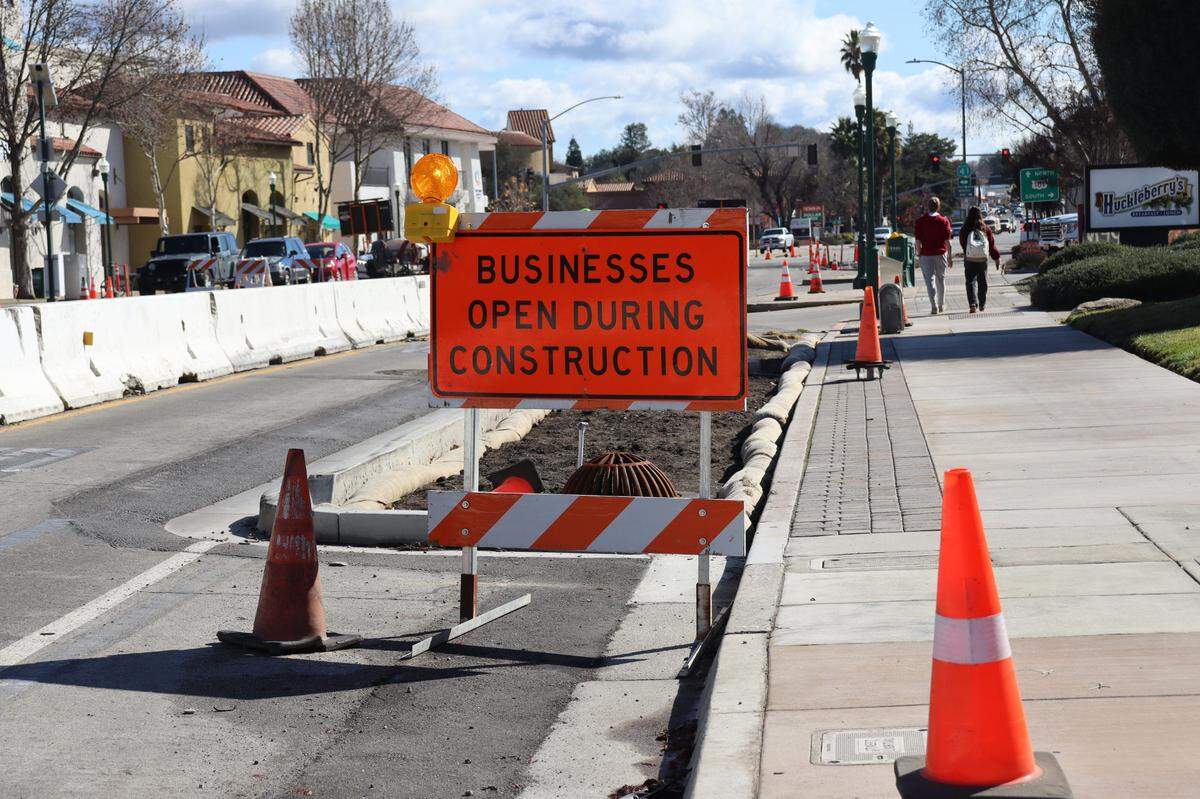 Downtown Atascadero businesses remained open during construction on El Camino Real, as indicated by signs lining the main drag on Jan. 27, 2025. Construction began in June 2024 and will last until the summer of 2025.