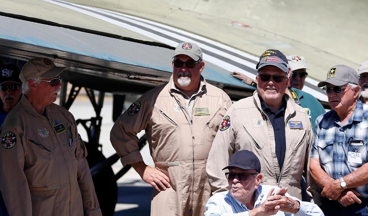 Sherman Smoot, right, was the pilot of the WWII-era Betsy’s Biscuit Bomber that took local veterans on an Honor Flight on Saturday, Aug. 27, 2022, from the Paso Robles Municipal Airport. Smoot was killed when the vintage plane he was flying crashed near Minter Field in Shafter on Sept. 2, 2022. With him herre are flight attendant John Doyle, left, and co-pilot Scott Stelzle.