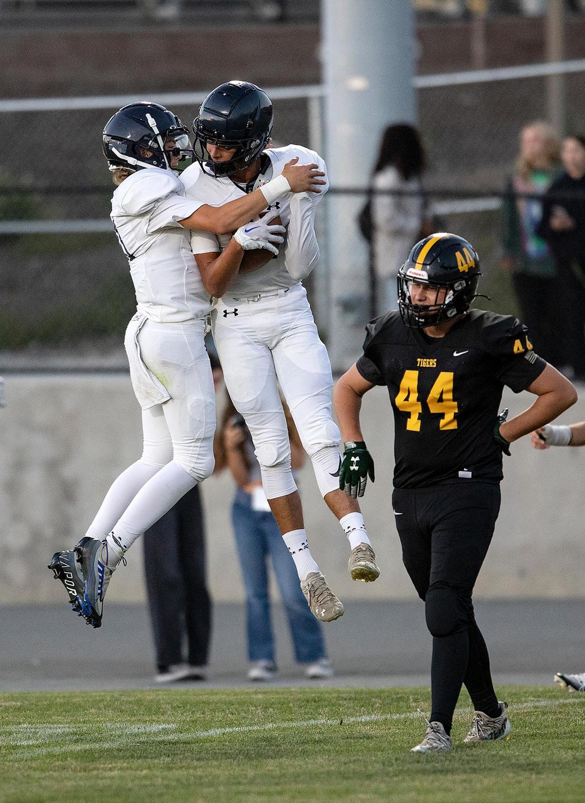 The Eagles’ Damion Santos (11) celebrates after scoring a touchdown as Arroyo Grande beat San Luis Obispo 26-14 on Friday, Sept. 2, 2022.