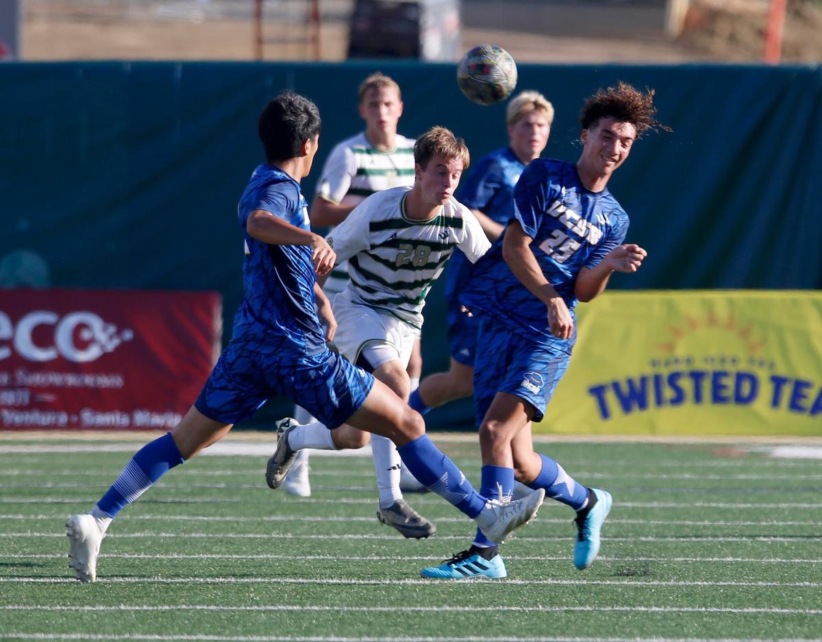 Cal Poly’s Finn Linas goes for a header against UCSB’s Isaiah Barber. Cal Poly beat UC Santa Barbara 2-0 in the annual Blue-Green Rivalry soccer game on Sept. 28, 2024.