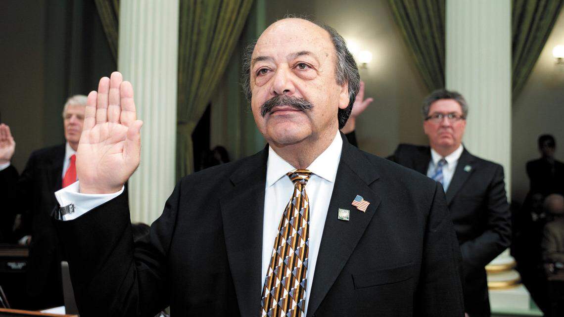 Assemblyman Katcho Achadjian, R-San Luis Obispo, takes the oath of office Monday, Dec. 3, 2012, in Sacramento.