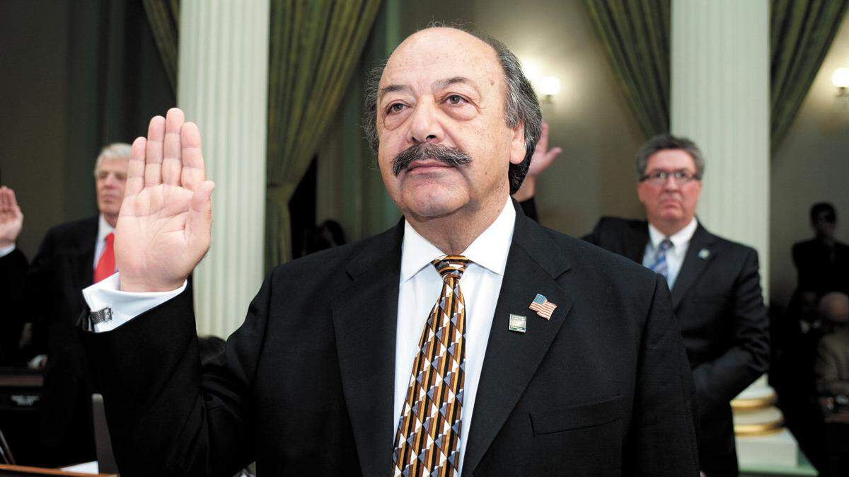 Assemblyman Katcho Achadjian, R-San Luis Obispo, takes the oath of office Monday, Dec. 3, 2012, in Sacramento.