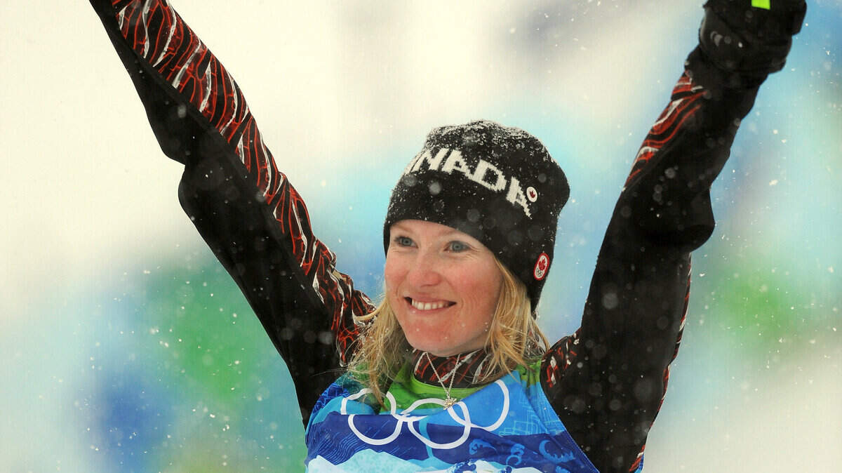 Canada's Ashleigh McIvor celebrates her gold medal in the women's ski cross. (Jason Payne / Canwest News Service / MCT)