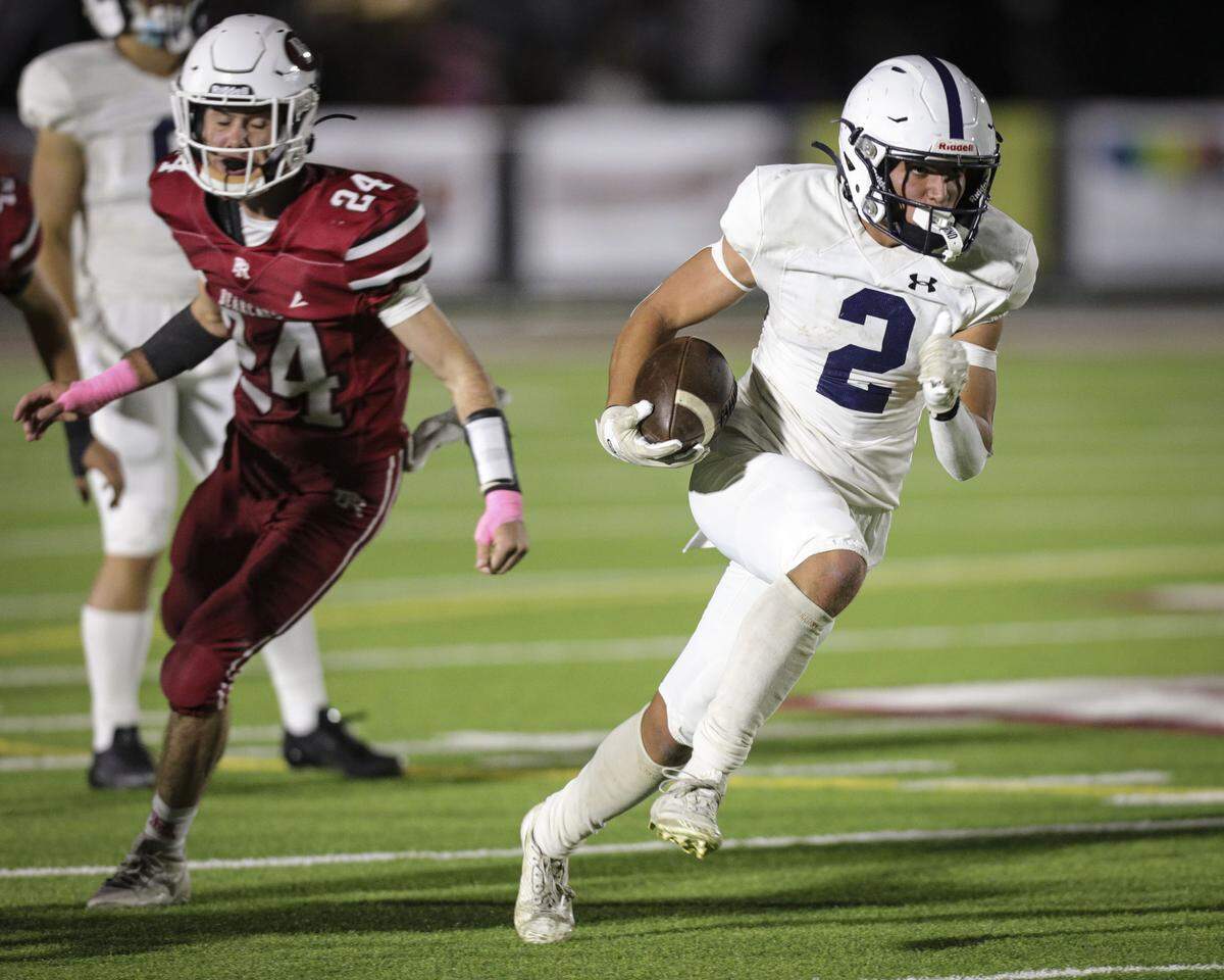 Levi Childers runs to an open path. Arroyo Grande beat Paso Robles 56-14 on Oct. 3, 2025.