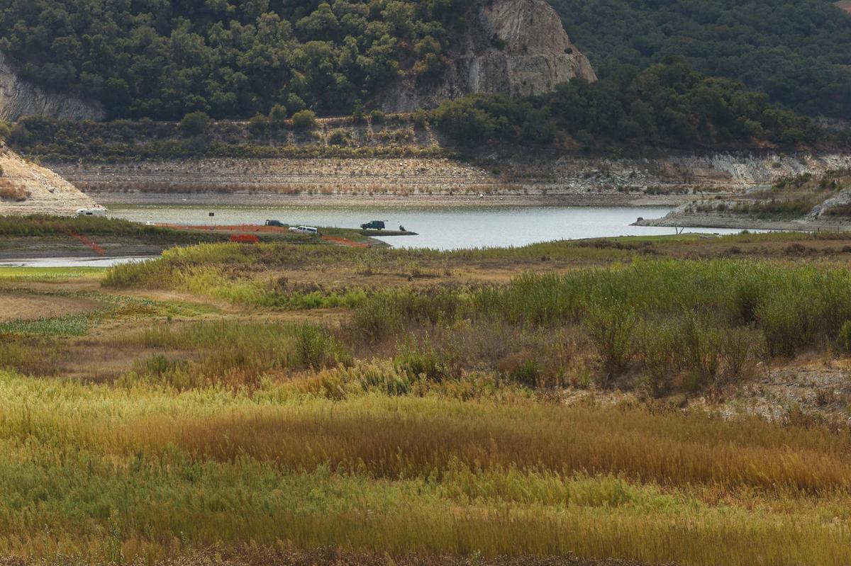 Cars park in area of the Wittenberg Arm of Lopez Lake that normally would be underwater. The lake is the primary water source for Arroyo Grande, Grover Beach, Oceano and Pismo Beach, and was at 31% capacity at the beginning of October 2021.